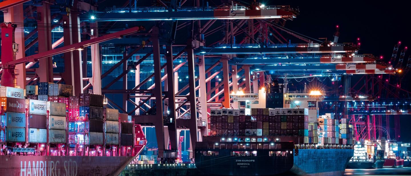 Harbour and logistics infrastructure viewed across an industrial waterfront