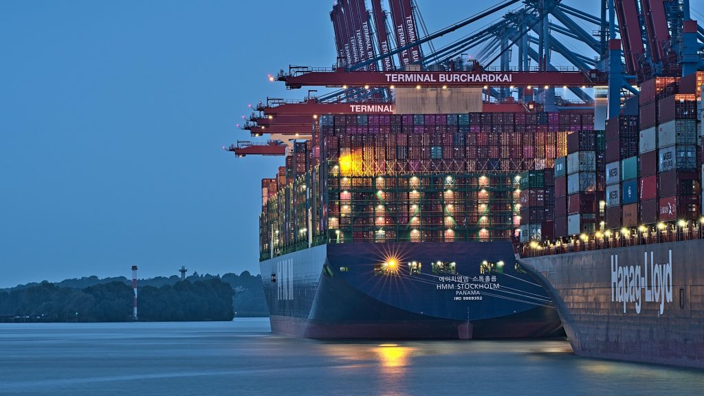 Cranes and container stacks at a marine terminal serving a metropolitan region